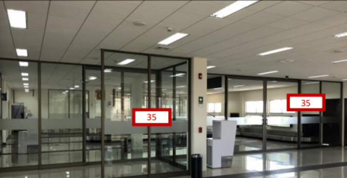 Foto de Ventanal panel interior divisorio, Salas de llegada 1 y 2 (Ambas caras) - Aeropuerto La Serena